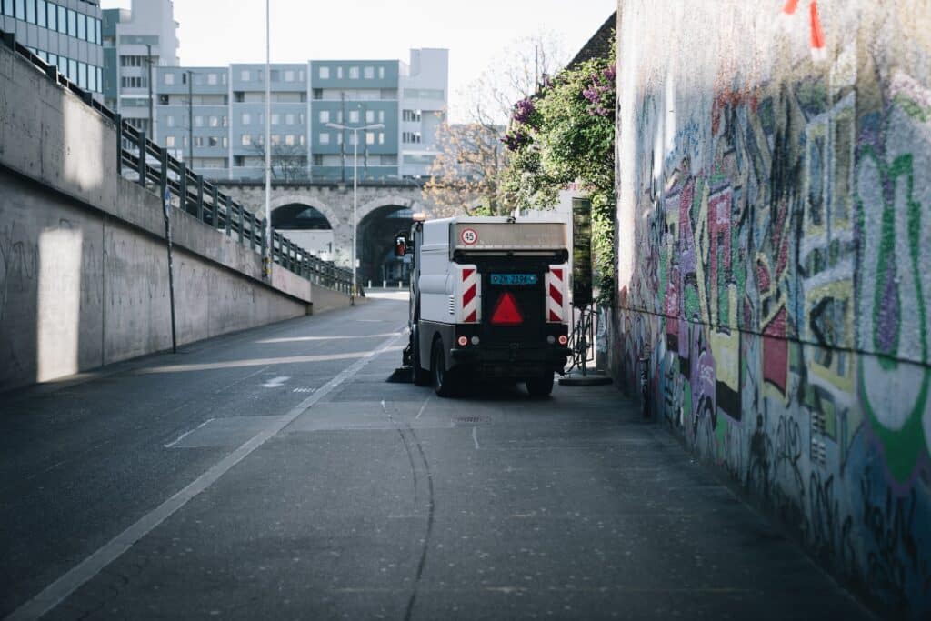 white and red truck on road during daytime